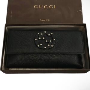 Authentic Gucci luxury designer signature black pebbled leather GG emblem wallet